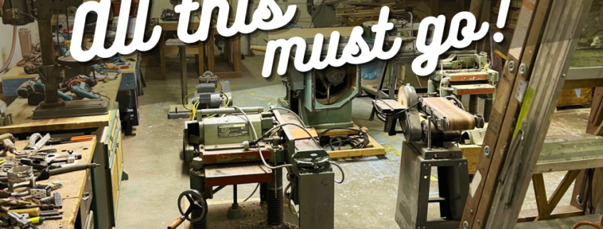 Photo of a large woodworking shop at Clay Tree, full of tools and equipment. Superimposed on top in diagonal text it says "All this must go!"